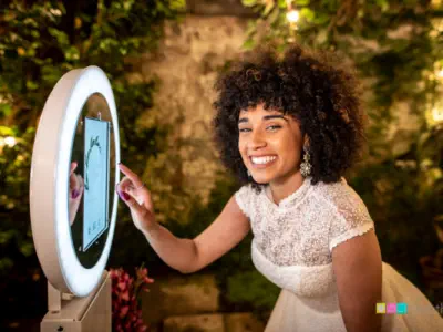 Bride using a photo booth